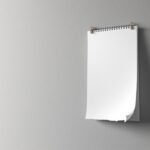 Kündigungsfrist für Arbeitnehmer: Was gilt während der Probezeit? Leerer Wandkalender mit abgerissenem Blatt auf neutraler Wand